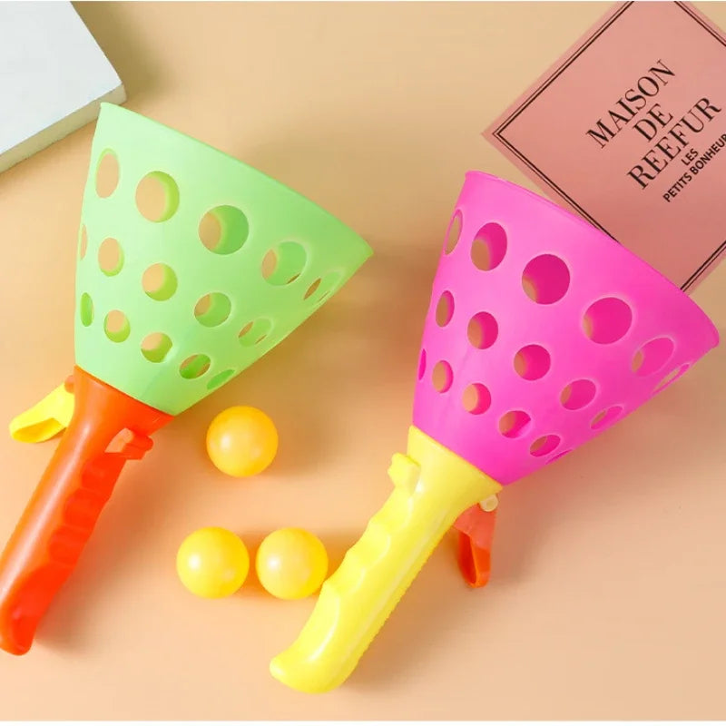 Click and Catch Twin Ball Toy