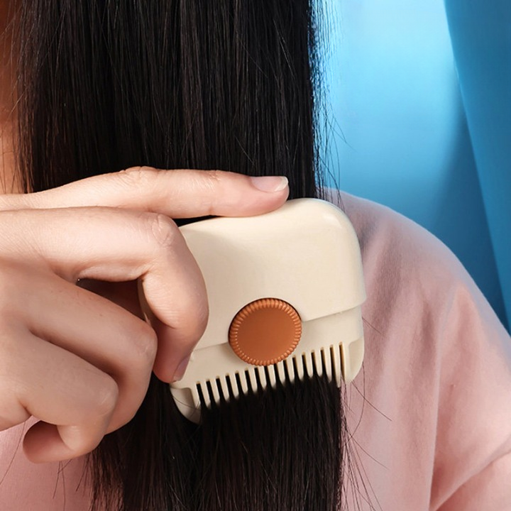 2 in 1 Trimmer Hair Comb by Budget Mart, featuring a comb attachment and sleek design for easy grooming.