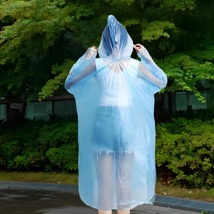 Lightweight waterproof rain coat in bright yellow, designed for disposable use, showcased on a white background.