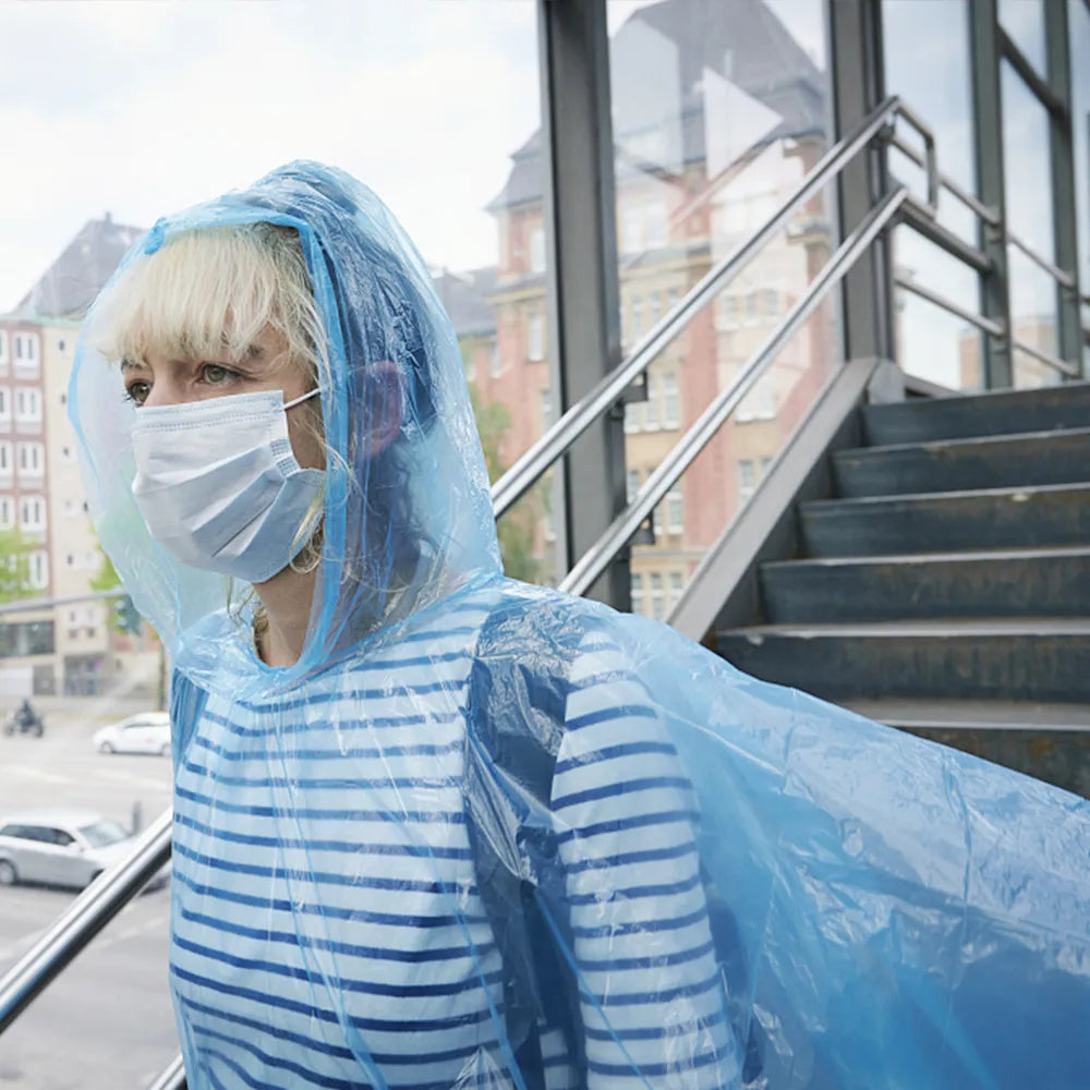 Lightweight waterproof rain coat in bright color, perfect for outdoor use, by Budget Mart.