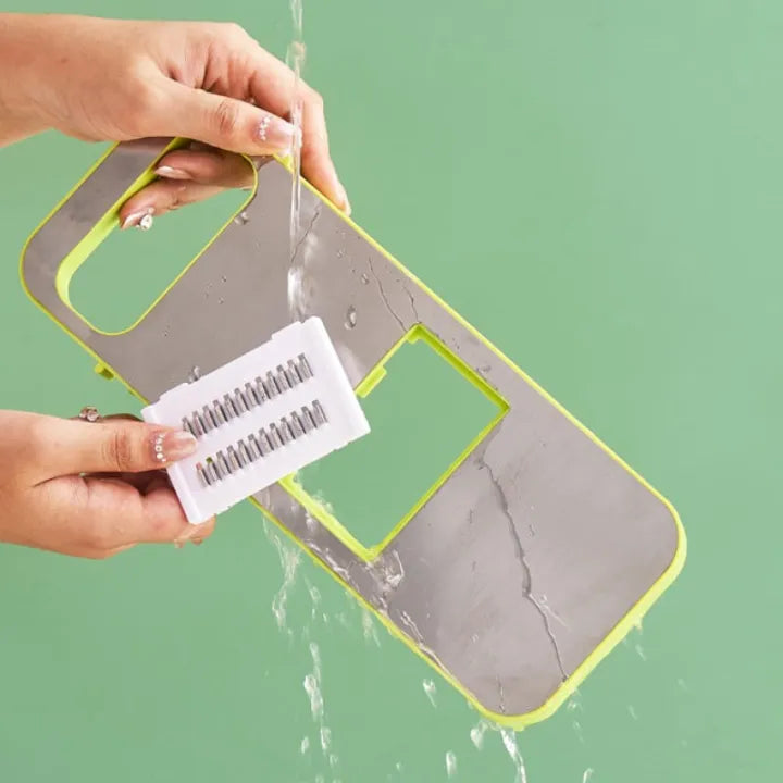 Multifunctional vegetable slicer by Budget Mart, featuring various blade options for slicing and dicing vegetables.