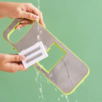 Multifunctional vegetable slicer by Budget Mart, featuring various blade options for slicing and dicing vegetables.