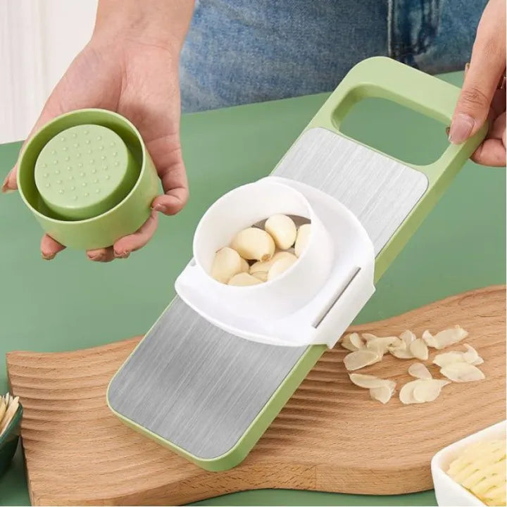 Multifunctional vegetable slicer by Budget Mart with various slicing options and ergonomic handle on a kitchen countertop.
